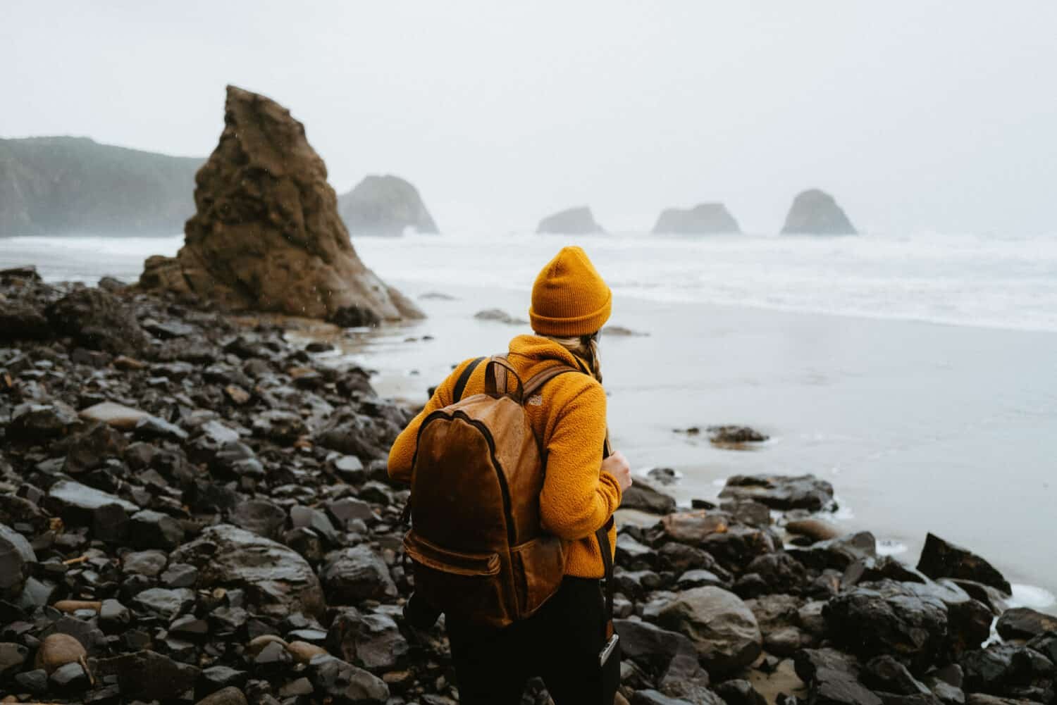 Emily Mandagie looking over to Crescent Beach sea stacks on the Oregon Coast