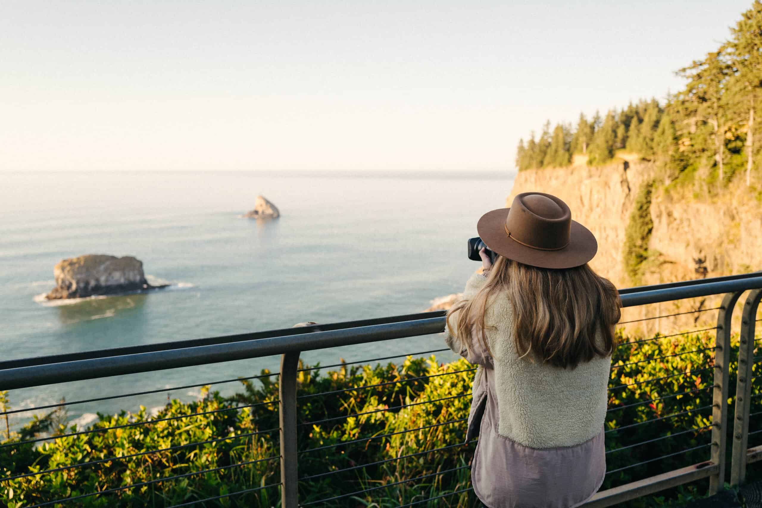 Emily Mandagie taking photos at Cape Meares along the Three Capes Scenic Loop Drive