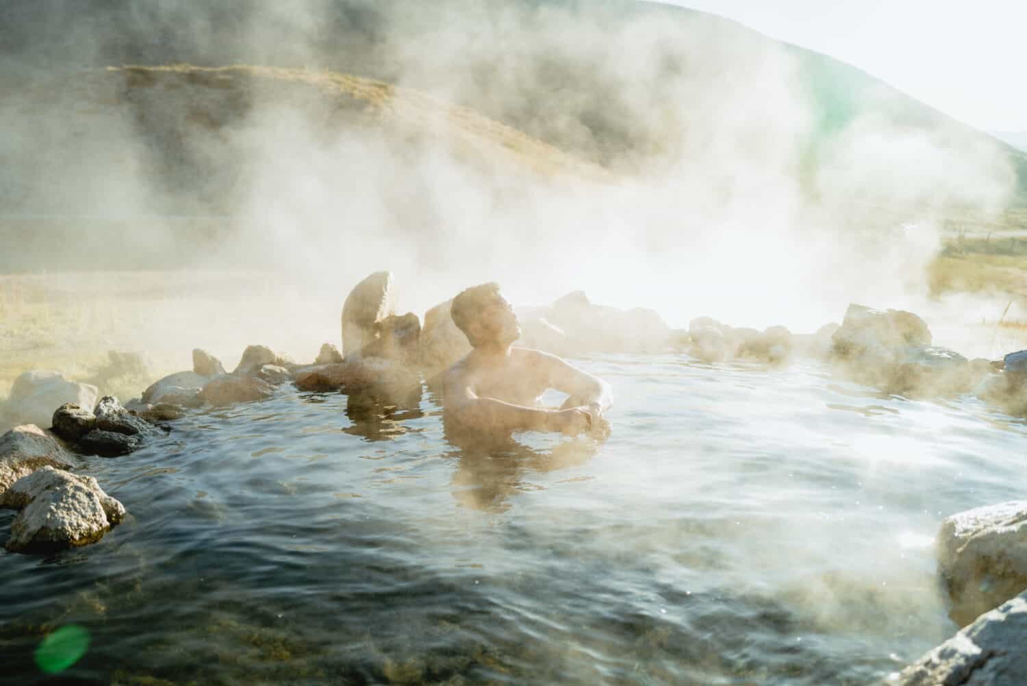 Berty Mandagie soaking in Worswick Hot Springs