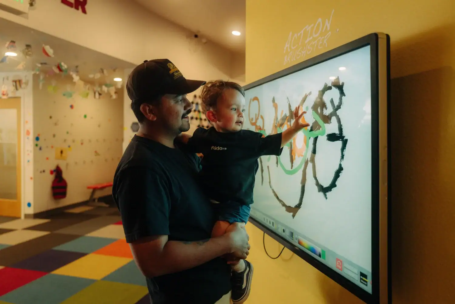 Father and son playing at the Artitorium on Broadway in Idaho Falls, 2025