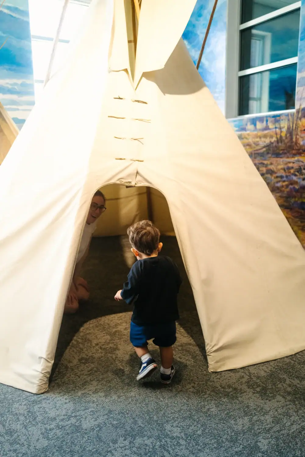Toddler exploring the kids section of the Museum of Idaho in Idaho Falls 2025