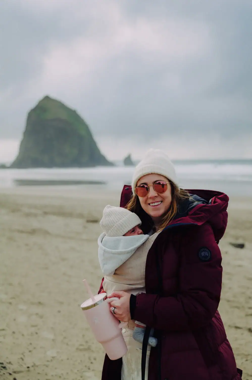 Emily Mandagie on the Oregon Coast with 7 week old baby - gear for nature families